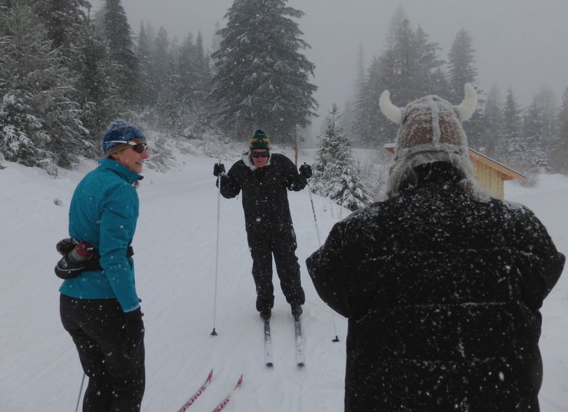 Lisa Sunderman of Spokane Nordic, left, starts a cross-country skiing lesson with The Spokesman-Review Slice columnist, Paul Turner, and his partner, Carol. (Rich Landers)