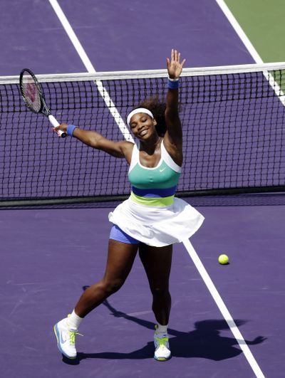 Serena Williams celebrates after a come-from-behind victory over Maria Sharapova, 4-6, 6-3, 6-0, to win her sixth Sony Open title. (Associated Press)