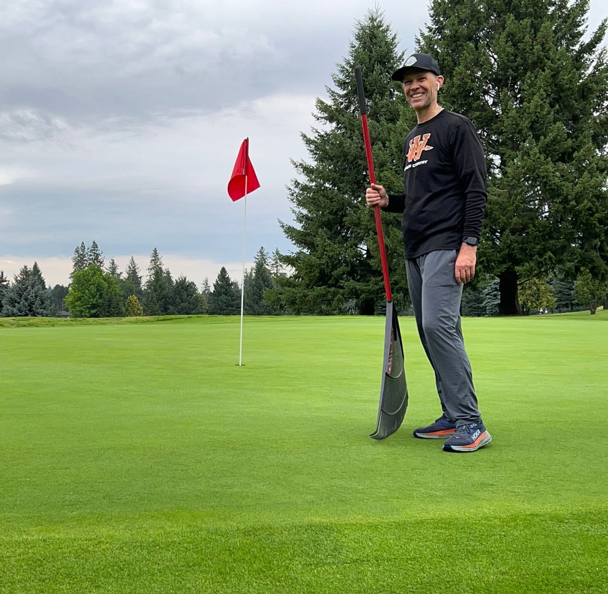 When that last school bell of the year sounds, West Valley High School history teacher Ty Brown swings into action tending the greens at Wandermere Golf Course.  (Photo courtesy of Ty Brown)