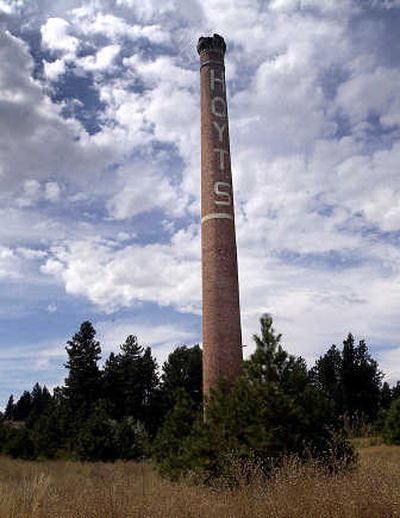 
Around 1900, the Hoyt brothers built the first of their six greenhouses on this land at the top of the Sunset Highway. The smokestack is all that remains of the old Hoyt Brothers Floral Co.
 (File / The Spokesman-Review)