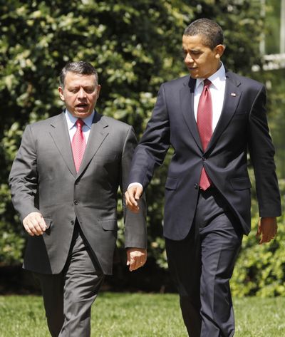 President Barack Obama walks with King Abdullah of Jordan after their meeting in the Oval Office of the White House in Washington on Tuesday.  (Associated Press / The Spokesman-Review)