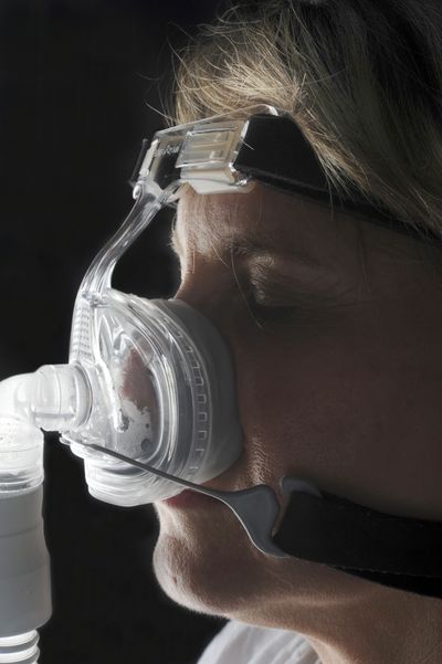 A mask attached to an air pump can help alleviate sleep apnea, which affects millions. Washington Post (Washington Post / The Spokesman-Review)