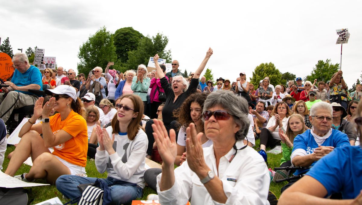 A crowd sprawls over a hill in Spokane