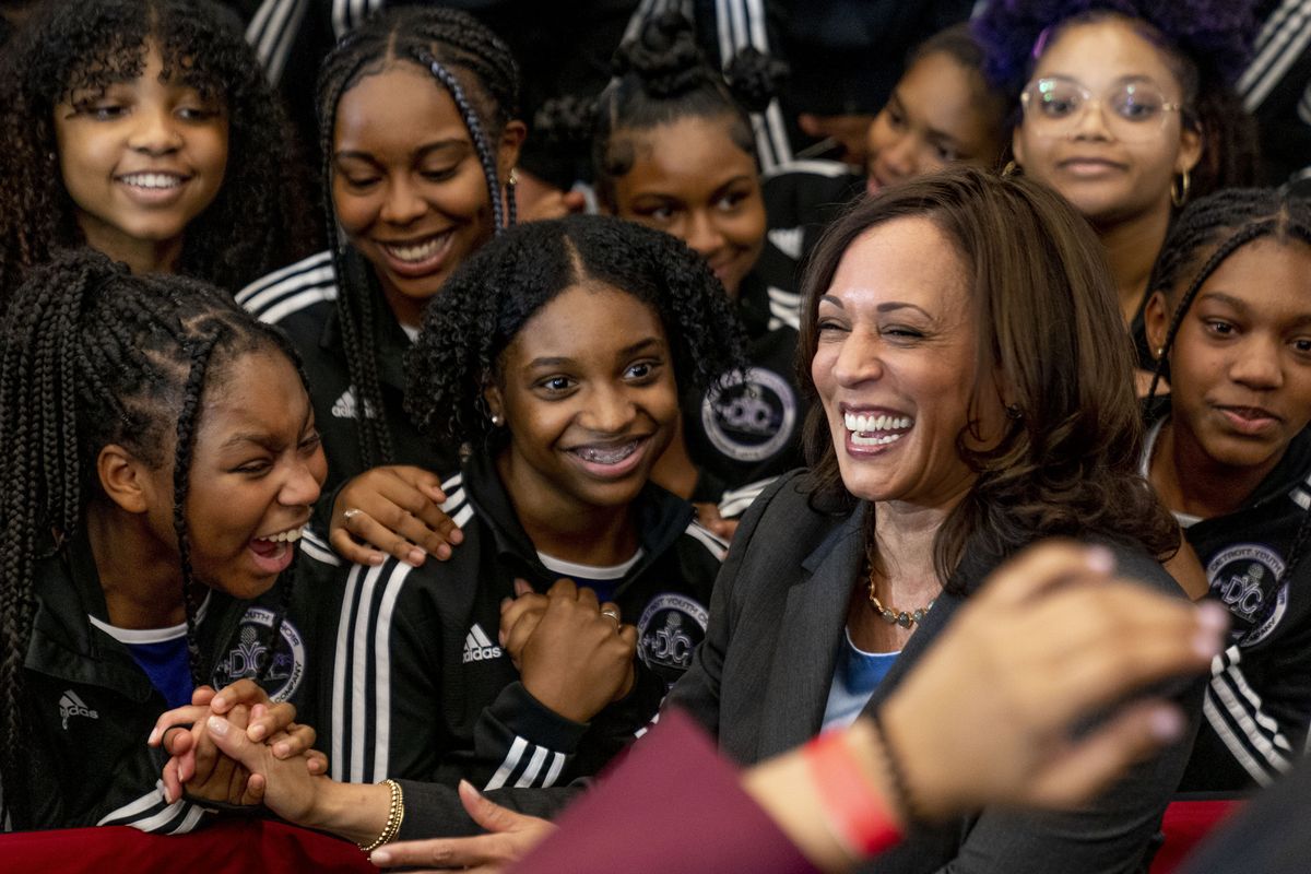 Vice President Kamala Harris greets members of the Detroit Youth Choir at a vaccine mobilization event at the TCF Center in Detroit, Monday, July 12, 2021.  (Andrew Harnik)