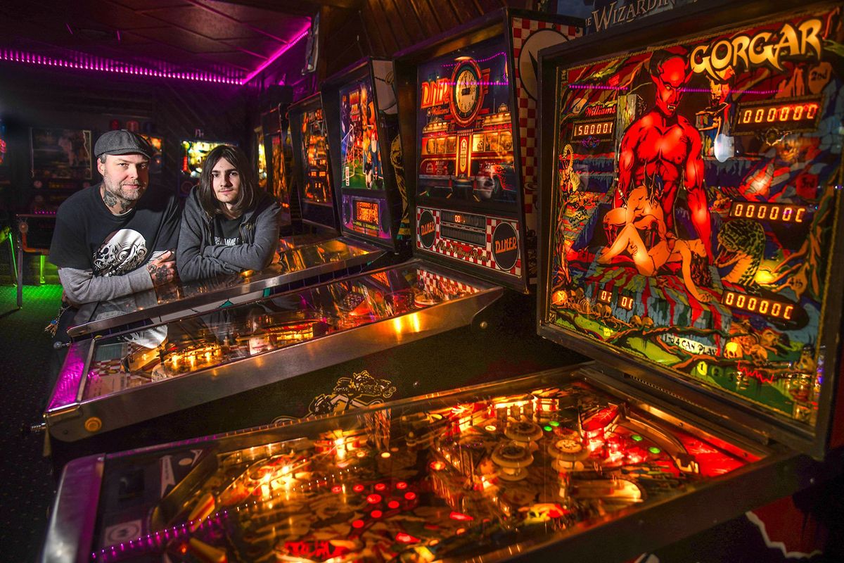 Jedi Alliance has been named the No. 2 arcade of the nation. Tyler Arnold and his son, Ashton, are shown in 2021 at the 5908 E. Broadway Ave. game stop. (DAN PELLE/THE SPOKESMAN-REVIEW)