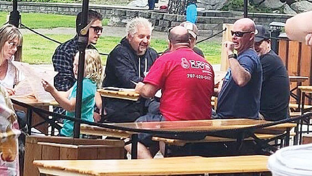 Guy Fieri, center, is seen in Leavenworth last June. His son Hunter Fieri is seen at left in the sunglasses.  (Courtesy of KHQ)