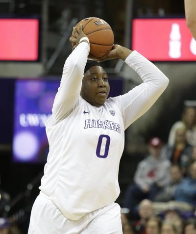 Washington’s Chantel Osahor set a Pac-12 record with 30 rebounds against Washington State on Sunday. (Elaine Thompson / FILE AP)