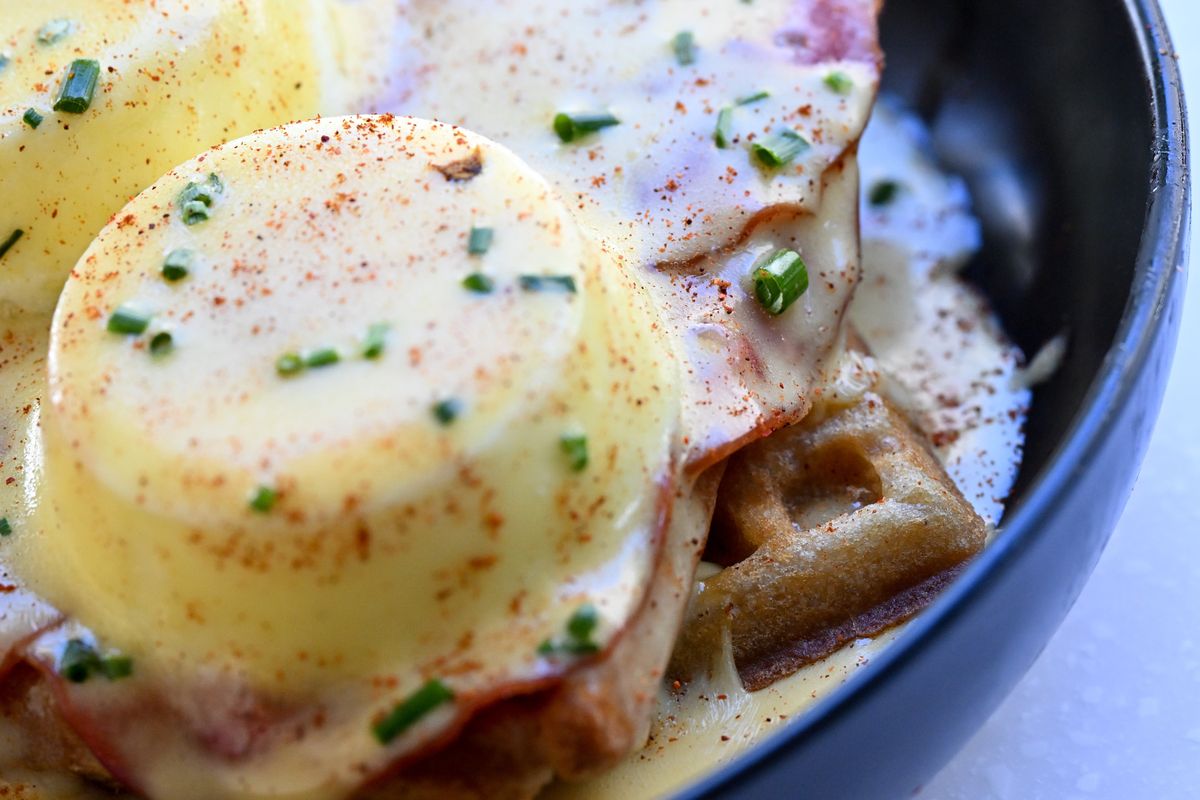The eggs Benedict waffle, ‘The Benny,” at the People’s Waffle.  (Tyler Tjomsland/The Spokesman-Review)