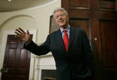 
Former President Bill Clinton laughs, as he and former President George H.W. Bush wrap up a session with reporters at the White House Tuesday about their recent tour of the Asian tsunami region.
 (Associated Press / The Spokesman-Review)