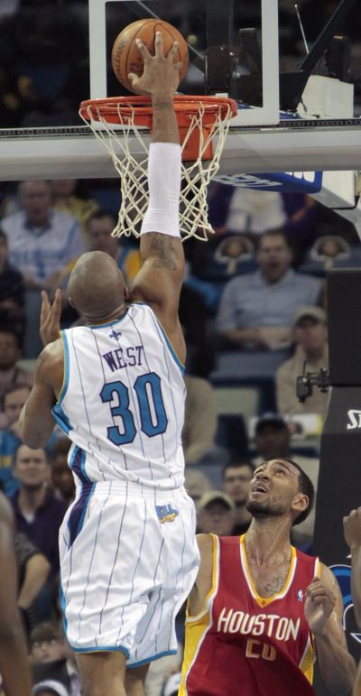 David West scored 27 points in New Orleans Hornets’ win over Houston Rockets.   (Associated Press)