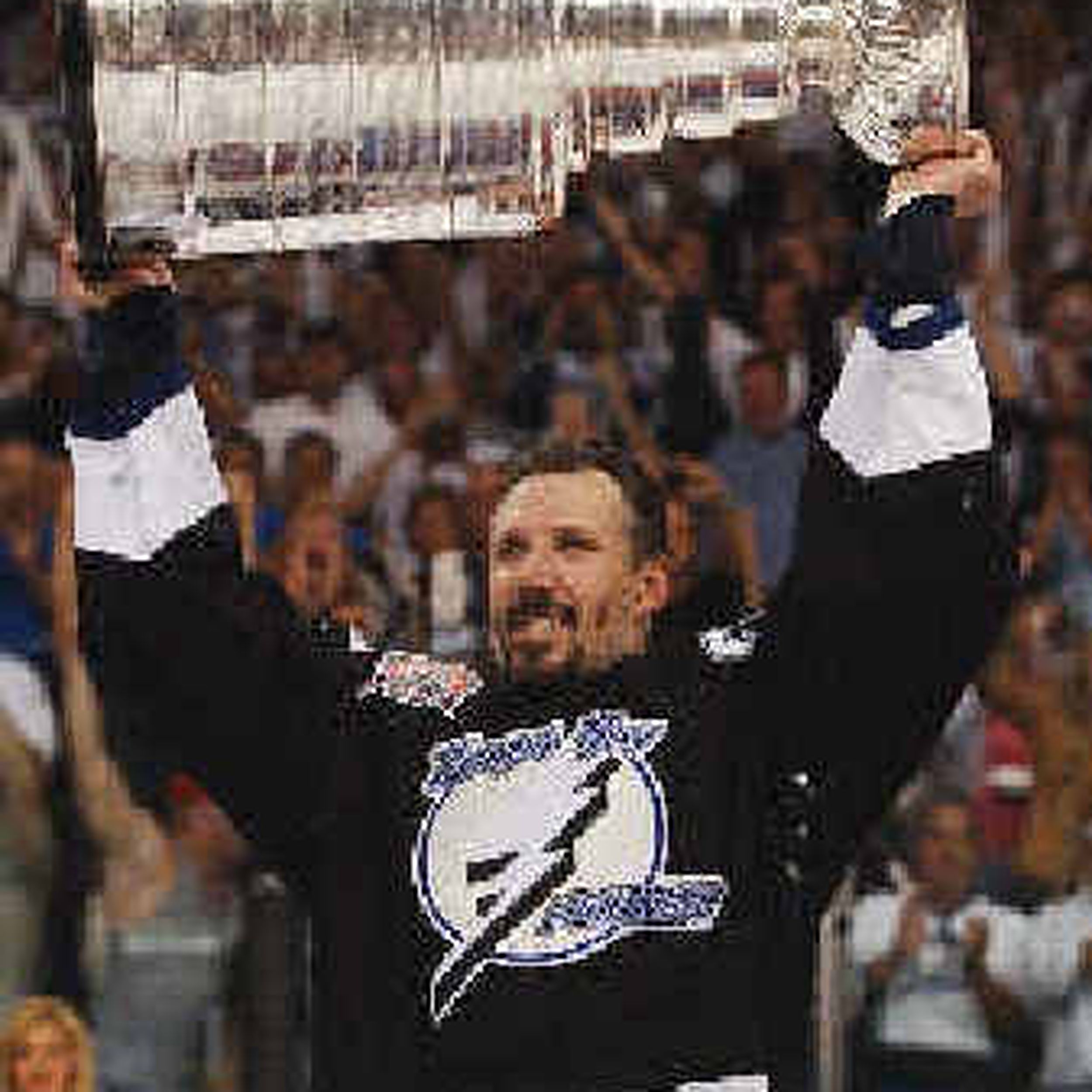 Photo: DAVE ANDREYCHUK, STANLEY CUP HONORED IN VICTORY PARADE AT