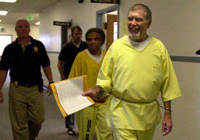 
Former federal fugitive Vincent Bertollini is led into the courtroom at the Bonner County Courthouse on Monday. 
 (Kathy Plonka / The Spokesman-Review)
