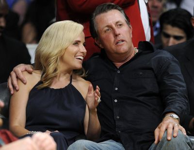 Amy and Phil Mickelson take in a Lakers playoff game in May. (File Associated Press / The Spokesman-Review)