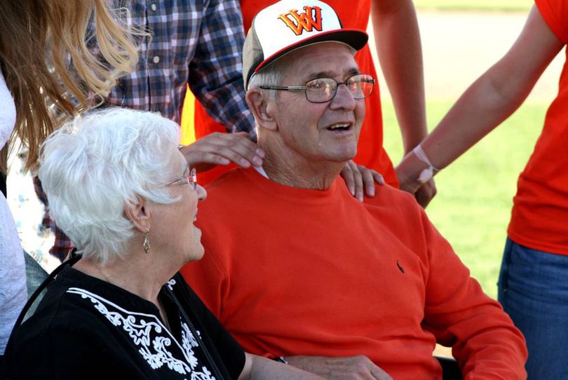 Jack Spring and his wife, Vona, sit together during the dedication of the West Valley High School baseball field in Spring’s honor on Friday. (Steve Christilaw)