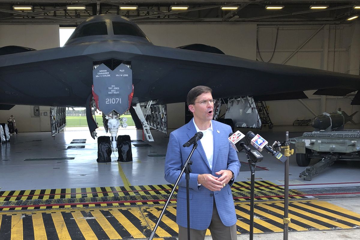 Defense Secretary Mark Esper speaks at Whiteman Air Force Base, Wednesday, July, 22, 2020 in Johnson County, Missouri. Esper is standing in front of a B-2 stealth bomber in a hangar at Whiteman.  (Robert Burns)