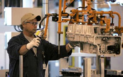 
Chuck Hallenby works on the assembly line at the General Motors Powertrain Warren transmission plant in Warren, Mich., on Thursday. 
 (Associated Press / The Spokesman-Review)