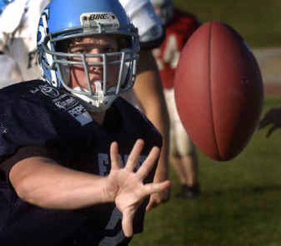 Andrew Dresback is the quarterback for Freeman High School. This marks the third straight year that a Dresback has led the team. His brother Jon previously held the position.
(Jed Conklin / The Spokesman-Review)