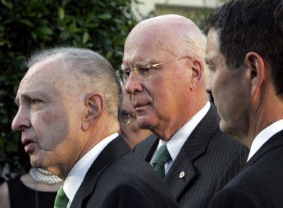 
Sens. Arlen Specter, R-Pa., left, Patrick Leahy, D-Vt., and Bill Frist, R-Tenn., speak with the media after a White House meeting with President Bush to discuss the second vacancy on the Supreme Court. 
 (Associated Press / The Spokesman-Review)