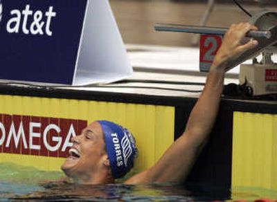 
Dara Torres laughs after winning 100-meter freestyle at the U.S. Swimming Nationals Wednesday. Associated Press
 (Associated Press / The Spokesman-Review)