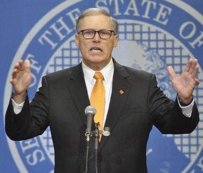 OLYMPIA – Gov. Jay Inslee denounces the rejection of Transportation Secretary Lynn Peterson by Senate Republicans as a “political hatchet job” during a press conference Monday. (Jim Camden / The Spokesman-Review)