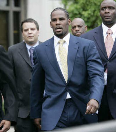 
R&B singer R. Kelly exits the Cook County Criminal Court Building on Friday in Chicago after his child pornography trial.Associated Press
 (Associated Press / The Spokesman-Review)