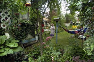 
The view into the backyard garden of Viktoria Bruens shows  years of work planting and pruning.
 (Photos by Christopher Anderson/ / The Spokesman-Review)