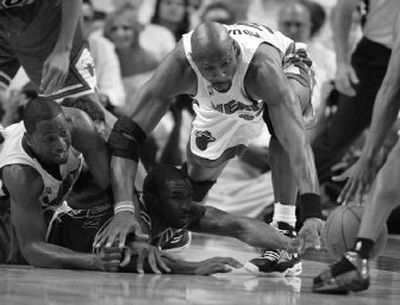 
Down 3-0 to Chicago in a best-of- 7 series, Miami is going to have to fight hard to keep their title defense alive. 
 (Associated Press / The Spokesman-Review)