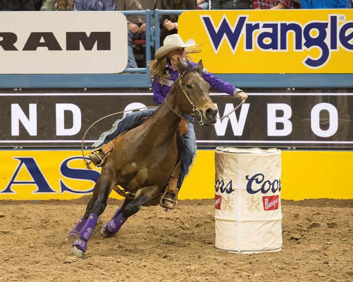 Pamela Capper of Cheney took first place at the National Finals Rodeo on Thursday with a 13.75-second run, which tied the event first-round record. (Kirt Steinke Western Rodeo Images)