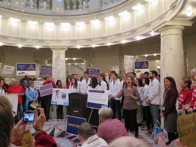 At a health care rally in the Idaho Capitol rotunda on Thursday, March 15, 2018, a sign-language interpreter translated for the crowd as speakers called for approving the Idaho Health Care Plan, Gov. Butch Otter's dual-waiver proposal that's stalled in committee. (The Spokesman-Review / Betsy Z. Russell)