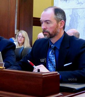 Rep. Sage Dixon, R-Ponderay, a new member of the Idaho Legislature’s joint budget committee, tried unsuccessfully on Friday to eliminate funding for mental health treatment for newly released felons from next year’s state budget, saying he felt the money was needed for roads. At right is Rep. Luke Malek, R-Coeur d’Alene. (Betsy Z. Russell)