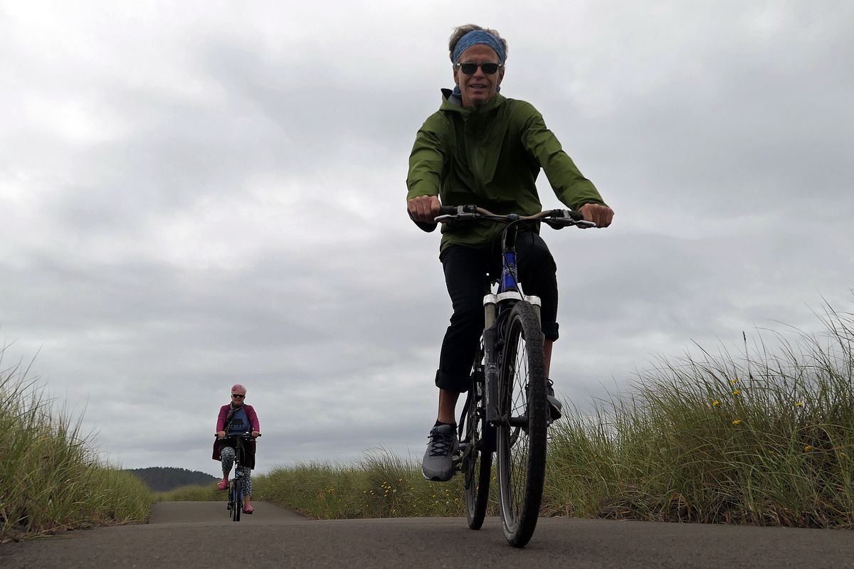 The Discovery Trail is a paved path that winds through the dunes near Cape Disappointment State Park, which is open year-round. (John Nelson)