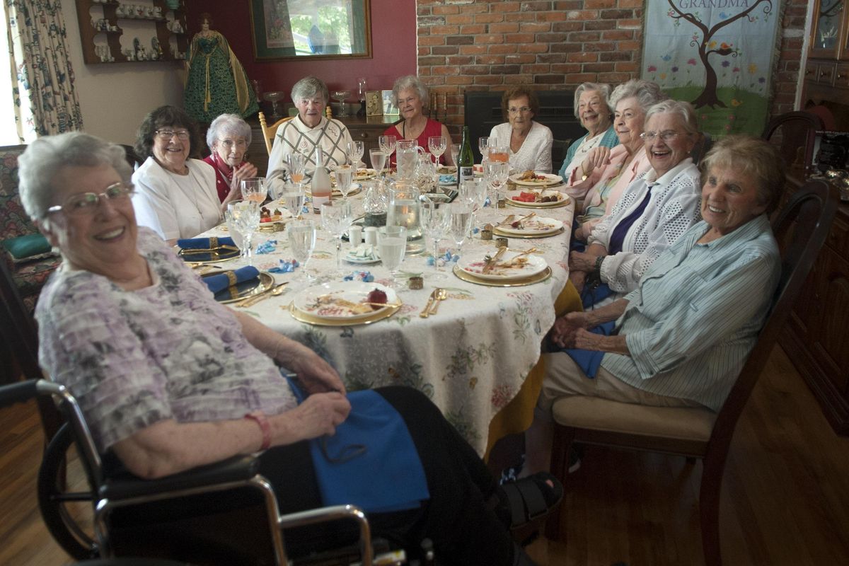 Marycliff High School Class of 1947 members, from left Corrine Chasse, Mary Ann Agnew, Jean McMillan, Maxine Keogh, Flo Robinson, Kathleen Kallas, Mary Conley, Lorraine Schubert, Geneva Moloney, and Betty Jean Fulks, pose for a picture during the 70th class reunion in Spokane on Monday, June 19. (Kathy Plonka / The Spokesman-Review)