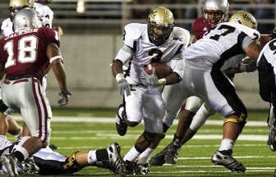 
Deonte Jackson  has helped carry Idaho to fourth in WAC rushing. Associated Press
 (Associated Press / The Spokesman-Review)