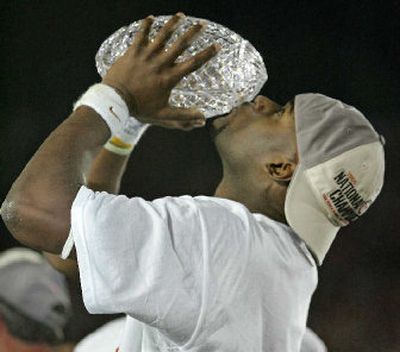 
There are those who would like to kiss the current BCS format goodbye, but perhaps not last year's MVP, Vince Young of Texas. 
 (File Associated Press / The Spokesman-Review)