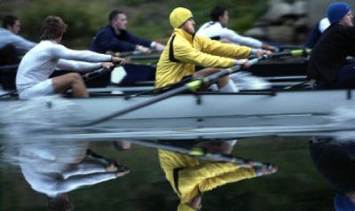 
Sean Haase, left, Ryan Roller, center, and K.C. Anderson row during a cold early morning practice on the Spokane River  last week.  The 30-member Gonzaga crew team practices in every weather condition except lightning. 
 (Joe Barrentine / The Spokesman-Review)