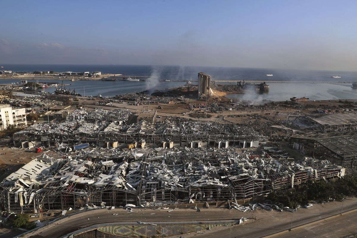 This photo shows a general view of the scene of an explosion that hit the seaport of Beirut, Lebanon, Wednesday, Aug. 5, 2020. A massive explosion rocked Beirut on Tuesday, flattening much of the city