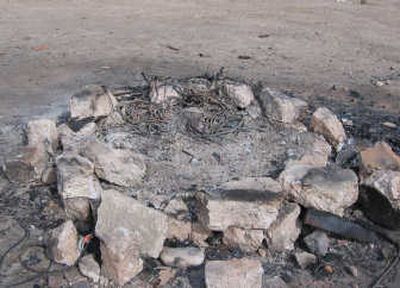 
Copper wire was illegally burned in a fire pit on Kuna Butte in the Snake River Birds of Prey National Conservation Area. Courtesy of U.S. Department of the Interior/Bureau of Land Management Idaho State Office
 (Courtesy of U.S. Department of the Interior/Bureau of Land Management Idaho State Office / The Spokesman-Review)