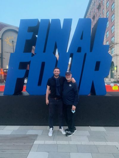 Patrick and Ron Spieker pose for a picture Monday about a block away from Lucas Oil Stadium in Indianapolis ahead of the NCAA Tournament title game between Gonzaga and Baylor.  (Courtesy of Ron Spieker)