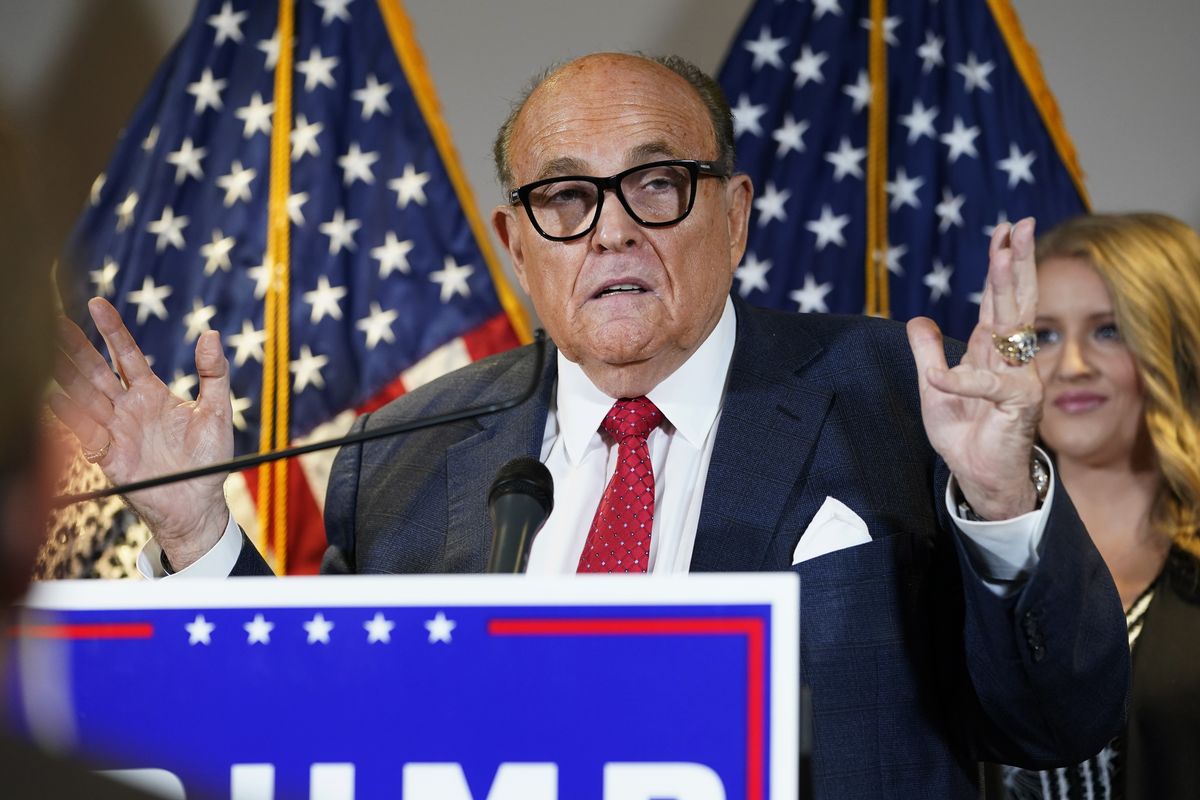 FILE - In this Nov. 19, 2020, file photo, former New York Mayor Rudy Giuliani, a lawyer for President Donald Trump, speaks during a news conference at the Republican National Committee headquarters, in Washington. Giuliani urged Michigan Republican activists on Wednesday, Nov. 2, 2020, to pressure the GOP-controlled Legislature to "step up" and award the state