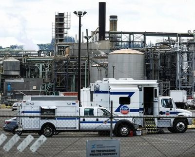 Crews work on the scene of the deadly implosion at Nippon Dynawave Packaging on May 30 in Longview, Wash.  (Seattle Times)