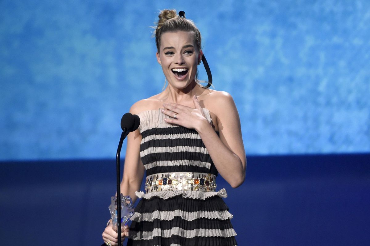 Margot Robbie accepts the award for best actress in a comedy for "I, Tonya" at the 23rd annual Critics