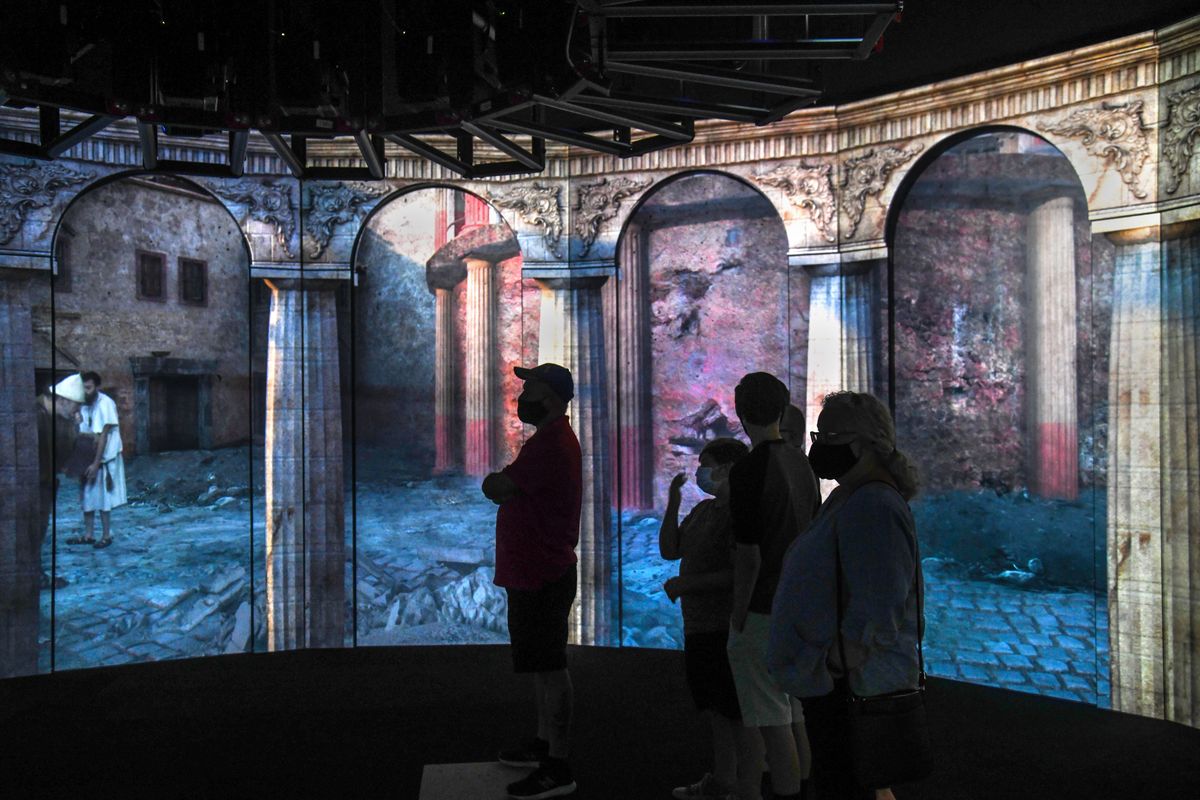 Visitors take in the Pompeii Experience 360-degree video at the Pompeii: the immortal city exhibit at the Northwest Museum of Arts and Culture, Friday, Aug. 28, 2020. (DAN PELLE/THE SPOKESMAN-REVIEW)