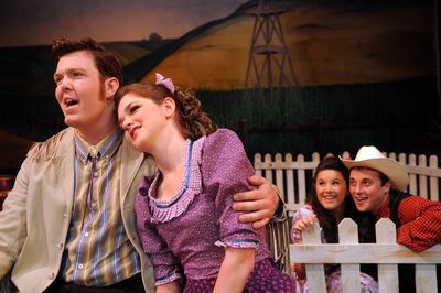 From left, Adam Peterson, Alyssa Day, Emily Cleveland and Cameron Lewis star in “Oklahoma!” by the Spokane Civic Theatre.  (Rajah Bose / The Spokesman-Review)