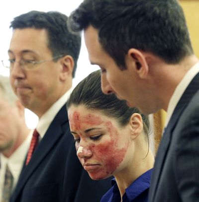 Bethany Storro, who falsely claimed a stranger threw acid in her face, stands before the judge during a brief court appearance in Clark County Superior Court Wednesday in Vancouver, Wash.  (Associated Press)