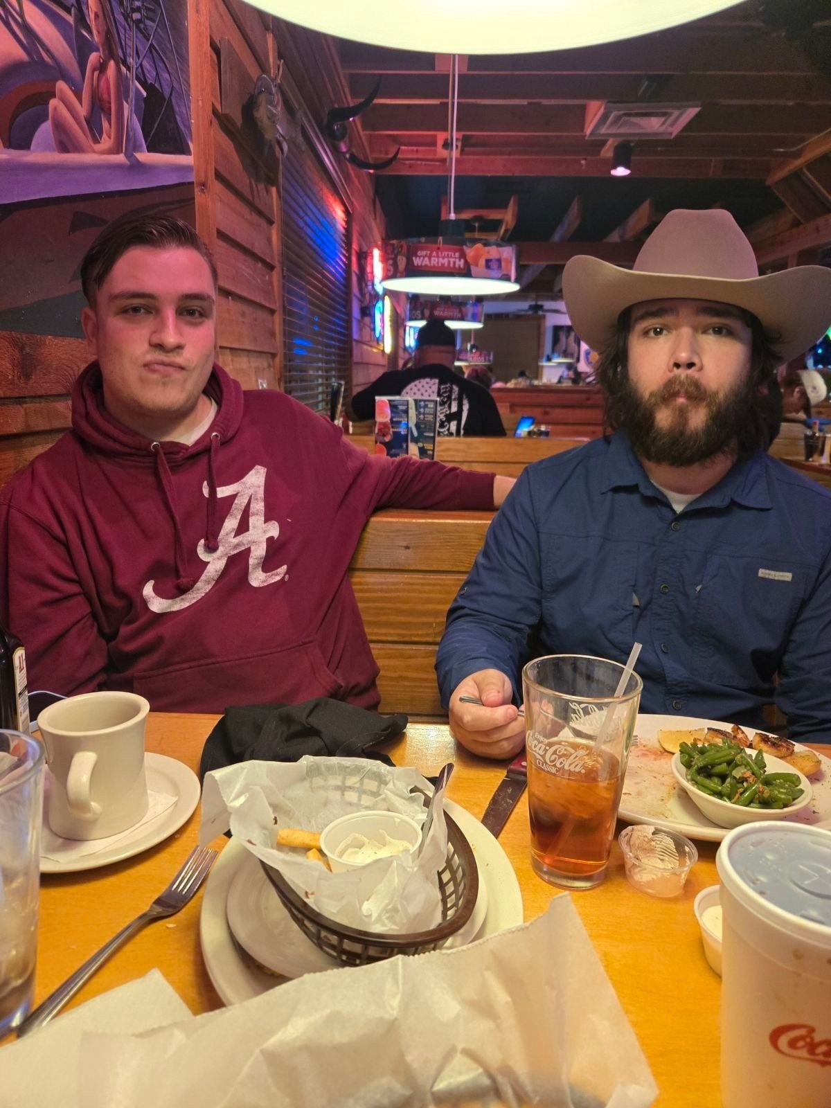 Wyatt Weller, left, and Garrett Weller celebrate Garrett’s birthday at Texas Roadhouse. The two brothers died in a fire Nov. 24 at their West Carnie Road home outside Coeur d’Alene. Michael Weller, the father of the men, said the restaurant was Garrett’s go-to place for a good steak.  (Courtesy of Michael Weller)