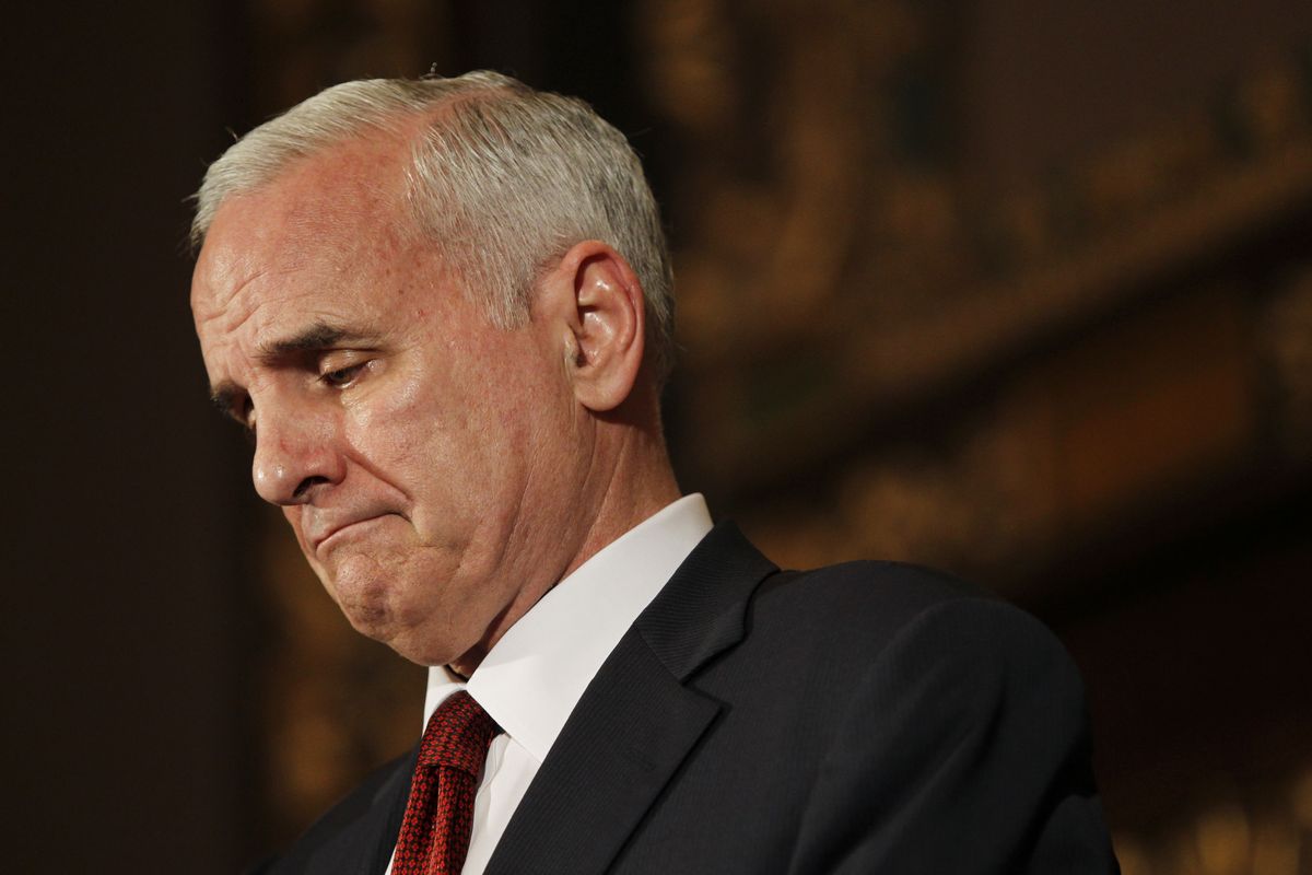 Gov. Mark Dayton speaks during a press conference before the midnight deadline. (Associated Press)
