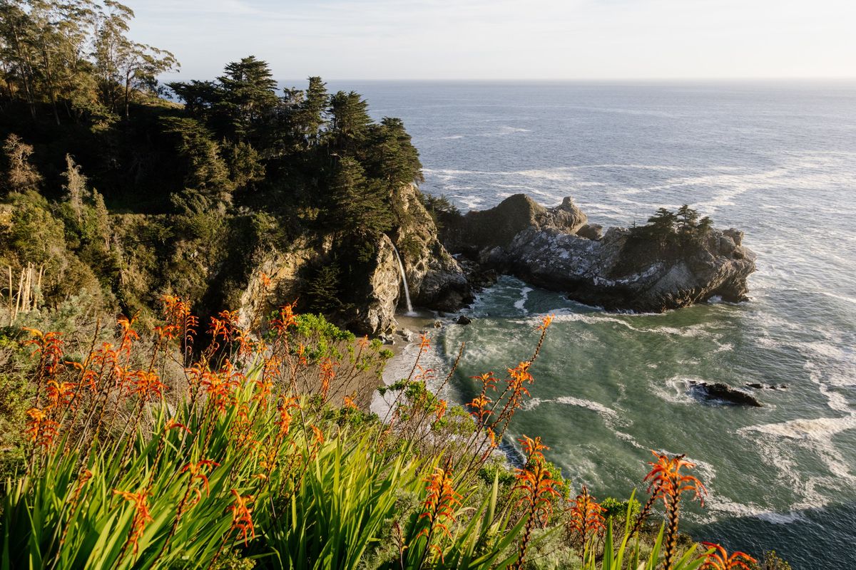 McWay Falls in Big Sur, Calif., March 17, 2024. Frugal travelers have options too in California’s exclusive and expensive Monterey County, especially those able to make a few splurges in between stunning nature sights, affordable restaurants and budget lodgings.  (JASON HENRY/New York Times)