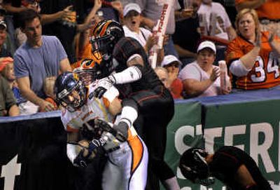 
The Louisville Fire made their intentions known from the first play, jolting Spokane's Brandon Leyritz against the boards during playoff action at the Arena. 
 (Jed Conklin / The Spokesman-Review)