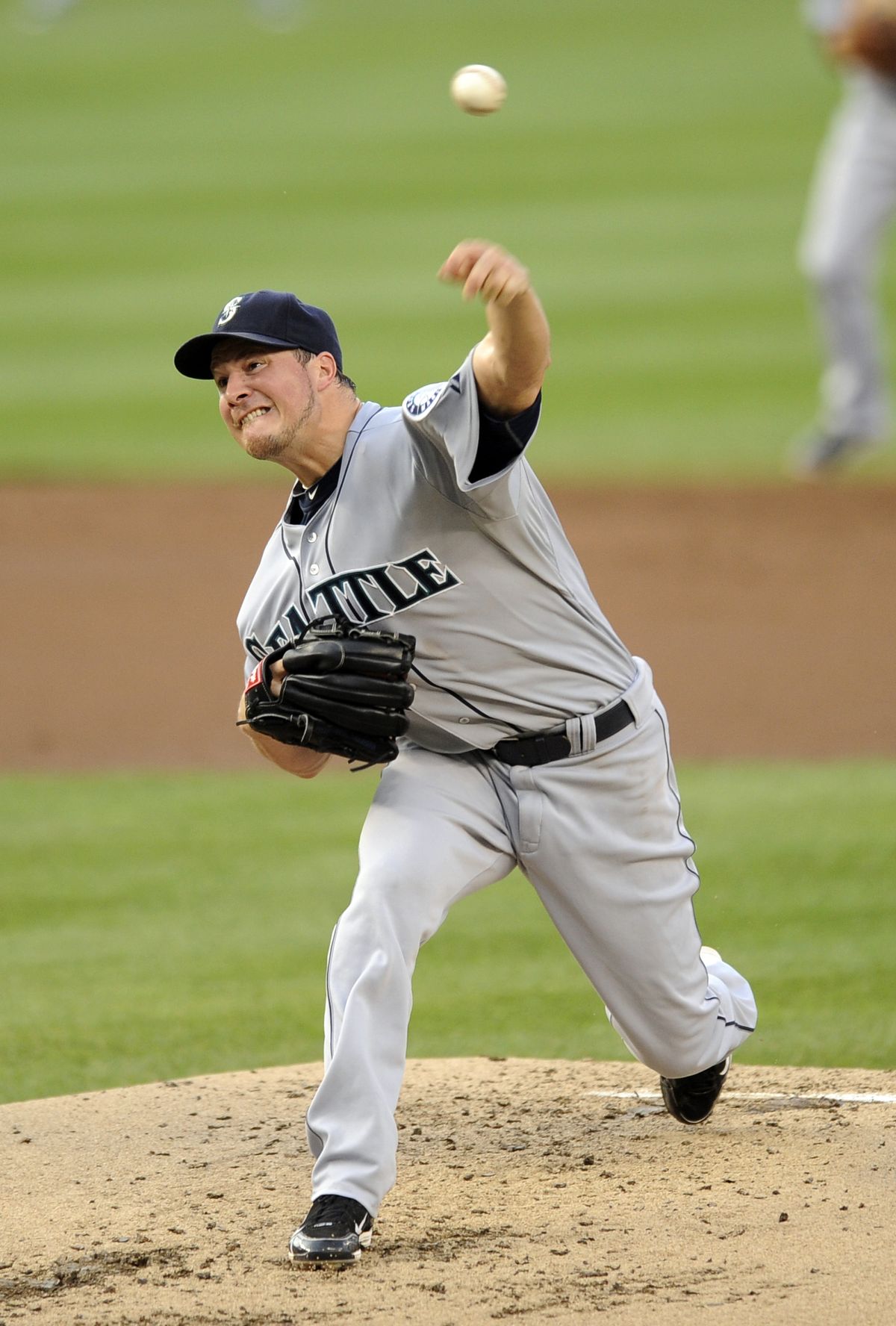Seattle Mariners starting pitcher Erik Bedard delivers a pitch against the Washington Nationals during the third inning of an interleague baseball game, Wednesday, June 22, 2011, in Washington. (Nick Wass / Associated Press)