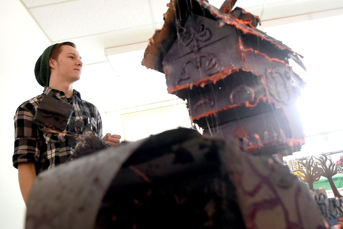 Sophomore Chase Maden talked about the gingerbreadlike“Nightmare Before Christmas”-inspired structure that he helped build at InTec in Spokane Valley on Tuesday, Dec. 13, 2016. (Kathy Plonka / The Spokesman-Review)